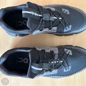 On Running Women’s Black and Gray Athletic Shoes